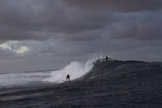 Judge removed from Olympics surfing panel after photo with athlete circulates on social media