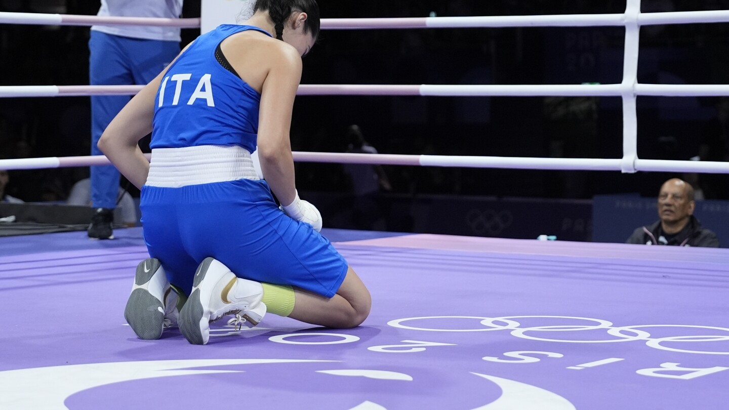 Who is Italian boxer Angela Carini and why did she quit her fight against Imane Khelif?