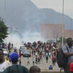 Rights group says security forces have killed 9 during protests over Nigeria’s economic crisis