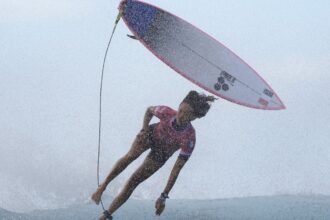 One Extraordinary (Olympic) Photo: Gregory Bull captures surfer battling waves in Tahiti