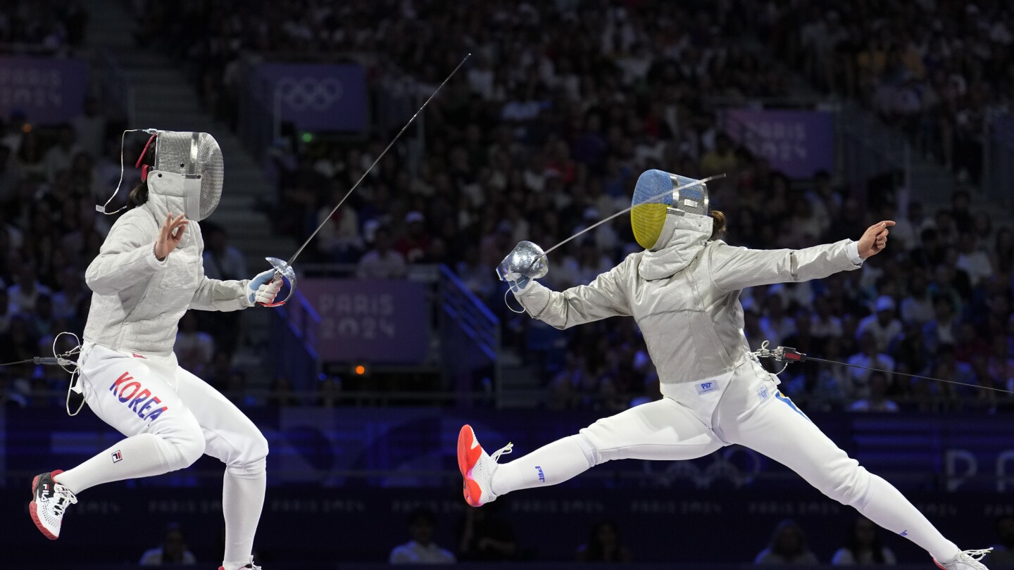 Ukraine wins its first gold medal of the Paris Olympics in women’s team saber fencing