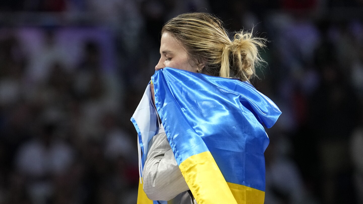 Ukraine wins its first gold medal of the Paris Olympics, in women’s team saber fencing