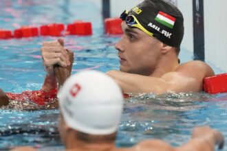 Not even an Olympic gold medal can get Hungarian swimmer Kristóf Milák to break his silence