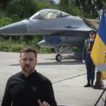 Ukraine’s Zelenskyy displays newly arrived F-16 fighter jets to combat Russia in the air