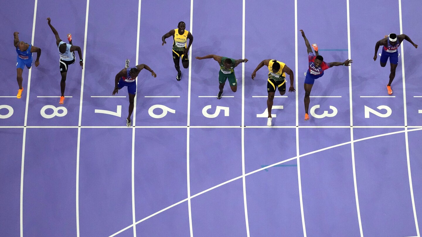 Noah Lyles wins a historically close Olympic 100-meter sprint by five-thousandths of a second