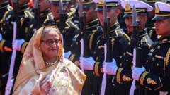 Sheikh Hasina: Bangladesh’s protesters want their PM to go. Can she hold on?