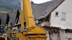 German hotel collapse kills two, trapping others under rubble