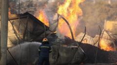 Greece fires: One dead as wildfires rage across Athens suburbs