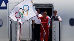 LA 2028: Olympic flag arrives in Los Angeles