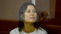 Ksenia Karelina: US-Russian woman jailed for 12 years for  charity gift