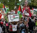 DNC: Group breaches fence as thousands join Gaza war protests