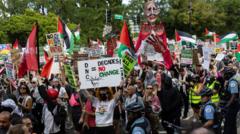 DNC: Group breaches fence as thousands join Gaza war protests