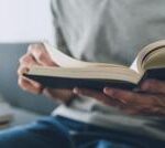 Italian burglar caught after sitting down with book