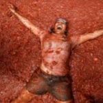 ‘Mind-blowing’: Thousands bathe in tomato sauce at La Tomatina