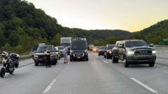 Kentucky: Manhunt resumes after cars shot at on US highway