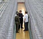 North Korea releases rare photos of Kim in nuclear facility