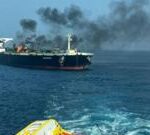 Burning oil tanker towed to safety to avert Red Sea spill