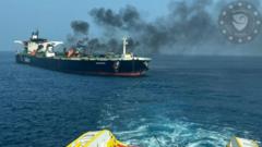 Burning oil tanker towed to safety to avert Red Sea spill