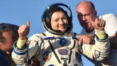 Space crew returns to Earth after longest stay on ISS