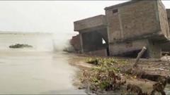 Bihar: Moment building collapses into flooded river in India