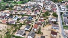 Bosnia floods and landslides leave 14 dead