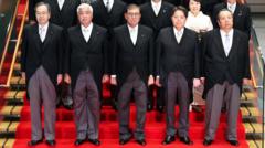 Japan’s government admits editing cabinet photo