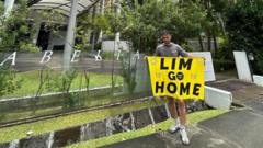 Valencia fans detained in Singapore over football protest