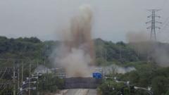 Watch moment North Korea blows up roads connecting to South Korea